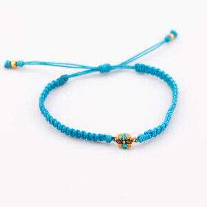 PO4059 - PULSERA DE FLOR EN TEJIDO MACRAME ORO DE 18K- G 0.700